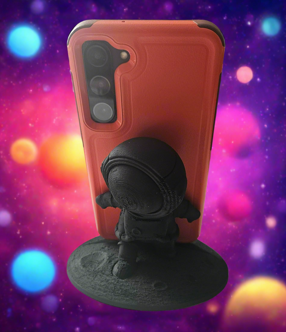 Astronaut Phone Stand, Cute Holder for Phones and Tablets, Cosmic Desk Organization, 3D Printed Desk Accessory, Space Organizer Tool